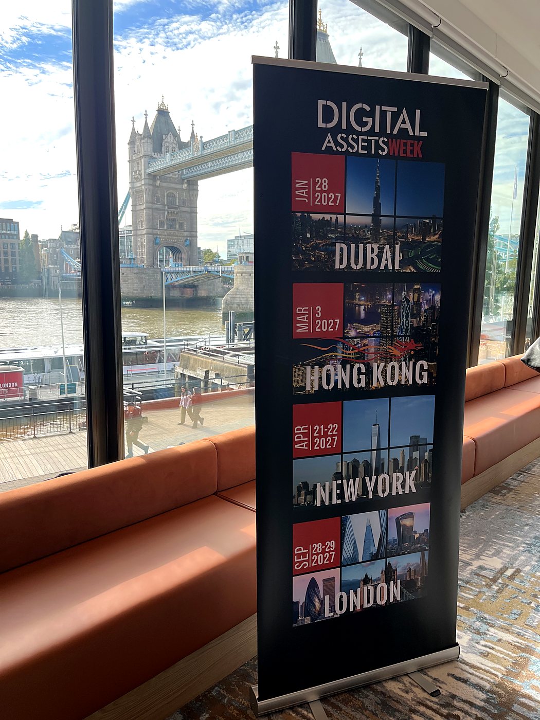 Digital Assets Week banner by the window overlooking Tower Bridge